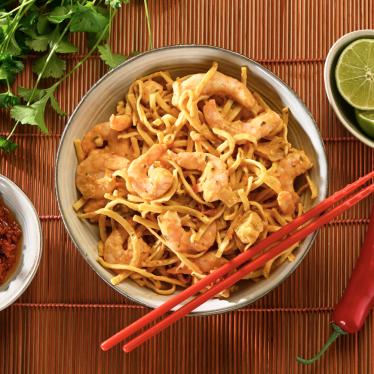 Scampi red curry met noedels